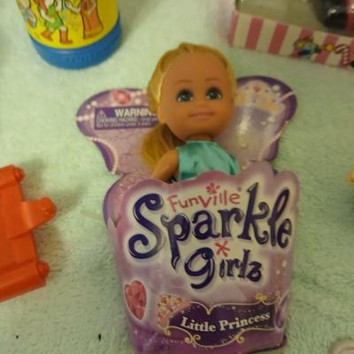 Grandkid's toybox - includes 1969 Mattel baby go bye bye bumpity car records, dolls, bubbles, and a great selection of new and...