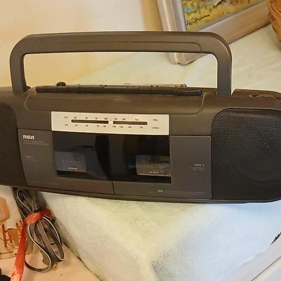 Exercising equipment with a RCA am/fm/ cassette deck radio - Get your groove on while you exercise!