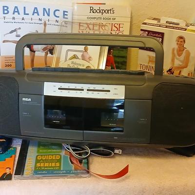 Exercising equipment with a RCA am/fm/ cassette deck radio - Get your groove on while you exercise!