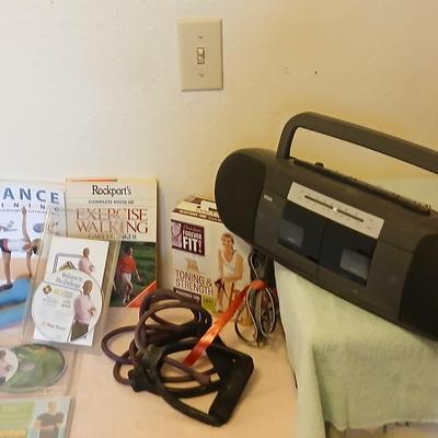 Exercising equipment with a RCA am/fm/ cassette deck radio - Get your groove on while you exercise!