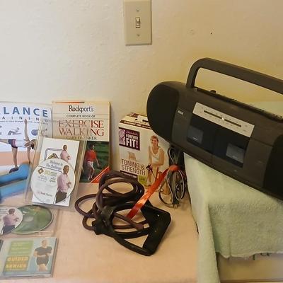 Exercising equipment with a RCA am/fm/ cassette deck radio - Get your groove on while you exercise!