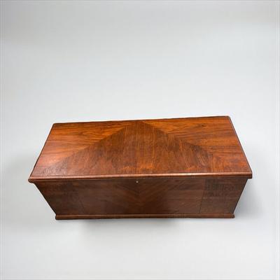 Sale Photo Thumbnail #33: Art Deco Waterfall Design cedar lined blanket chest. Lane Cedar Chest.  Chest has some wear on the top.  Original key is still stapled to the bottom of the chest.  The brackets that hold the lid open are missing.
47"X18.5"X20.5"