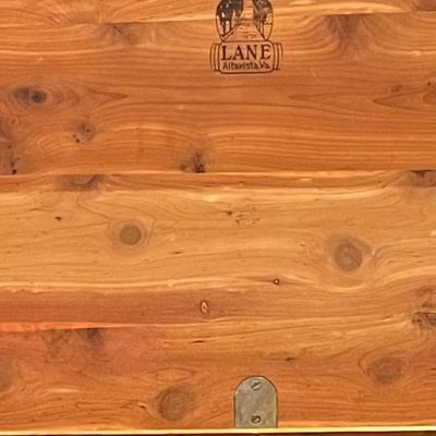 Sale Photo Thumbnail #36: Art Deco Waterfall Design cedar lined blanket chest. Lane Cedar Chest.  Chest has some wear on the top.  Original key is still stapled to the bottom of the chest.  The brackets that hold the lid open are missing.
47"X18.5"X20.5"