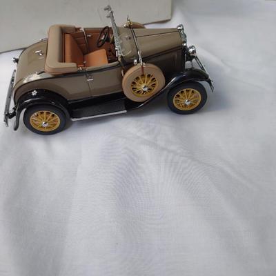 DANBURY MINT MODEL A DIE CAST CAR, A WOODEN MODEL OF A CLASSIC COUPE & TIN SIGN