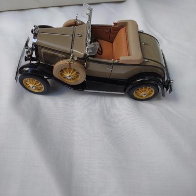 DANBURY MINT MODEL A DIE CAST CAR, A WOODEN MODEL OF A CLASSIC COUPE & TIN SIGN