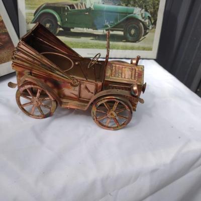 2 FRAMED PICTURES AND A METAL CAR