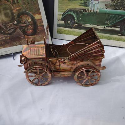 2 FRAMED PICTURES AND A METAL CAR