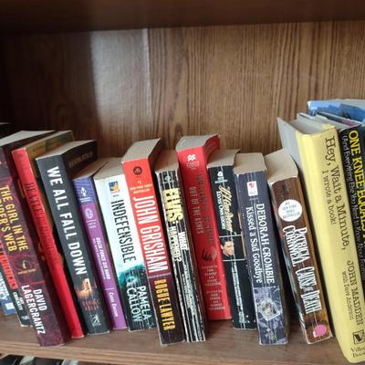 AN ASSORTMENT OF BOOKS AND 2 SMALLER BOOKCASES