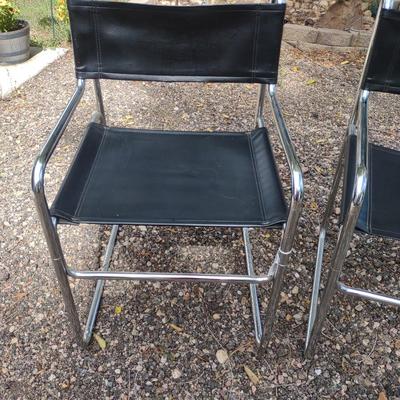 MID-CENTURY CHROME AND VINYL CHAIRS
