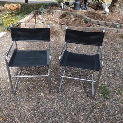 MID-CENTURY CHROME AND VINYL CHAIRS