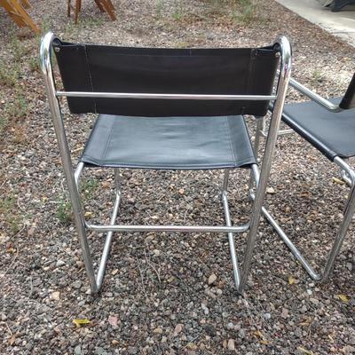 MID-CENTURY CHROME AND VINYL CHAIRS