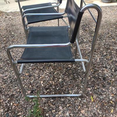 MID-CENTURY CHROME AND VINYL CHAIRS