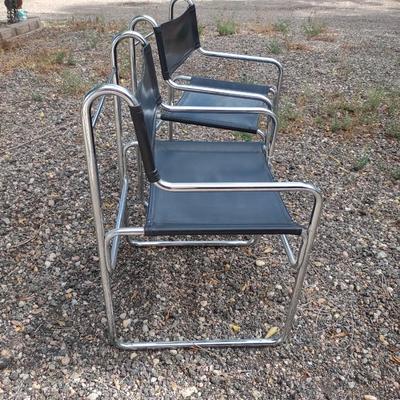 MID-CENTURY CHROME AND VINYL CHAIRS