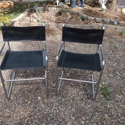 MID-CENTURY CHROME AND VINYL CHAIRS