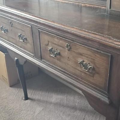Sale Photo Thumbnail #46: Approx 6ft wide and 7 ft tall.  Solid wood. 2 opening cabinet doors , one on each side.  3 drawers. probably oak. the drawers appear to have an inlay design on them.