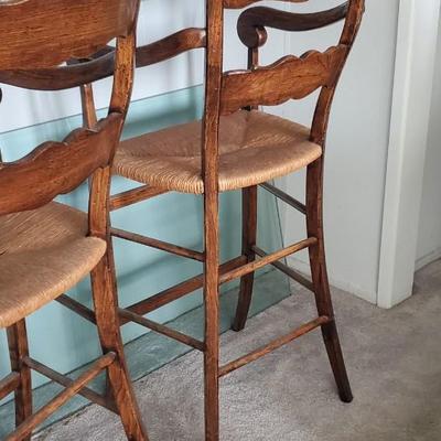 Sale Photo Thumbnail #57: This is a set of 2 chairs,  good condition, some discoloration on the rush seats.  Solid and handsome pair.  Approx 32" to the seat from the floor.