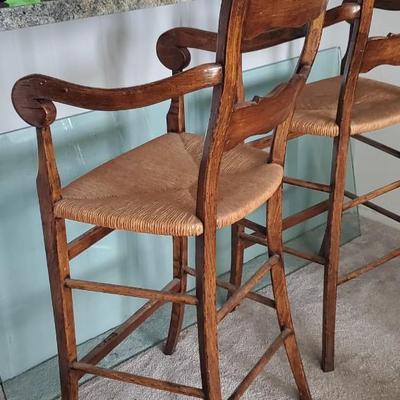 Sale Photo Thumbnail #56: This is a set of 2 chairs,  good condition, some discoloration on the rush seats.  Solid and handsome pair.  Approx 32" to the seat from the floor.