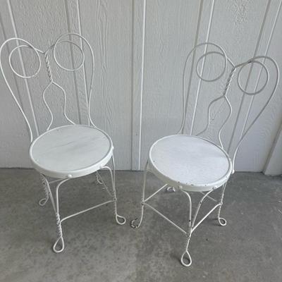 Sale Photo Thumbnail #3: Wrought iron chairs with wood seats.