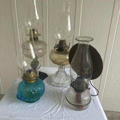Sale Photo Thumbnail #8: Variety of oil lamps being sold as a lot