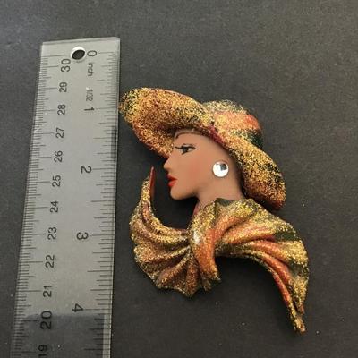 Vintage hand painted woman face brooch