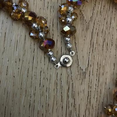 Beautiful Amber colored crystal bead necklace. Very beautiful very nice.