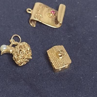 14 Yellow Gold Charms- House, Urn, and Diploma Designs- Approx Total Weight 10.1 Grams (#61)