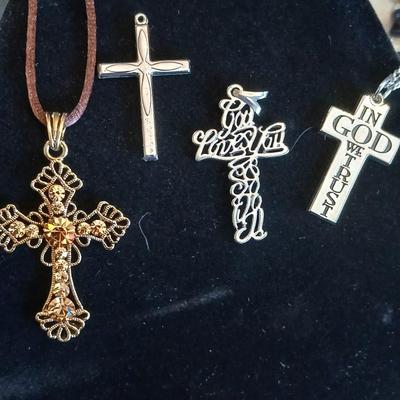 Four beautiful cross pendants - God Loves You - In God we Trust - rhinestone - and design crosses