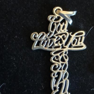 Four beautiful cross pendants - God Loves You - In God we Trust - rhinestone - and design crosses