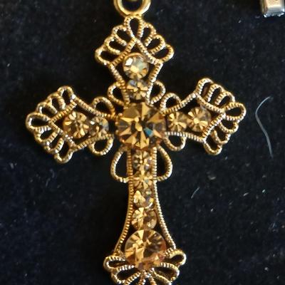 Four beautiful cross pendants - God Loves You - In God we Trust - rhinestone - and design crosses