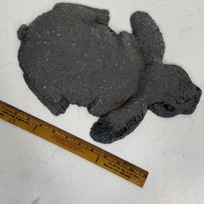 Sale Photo Thumbnail #356: Concrete-colored resin, very heavy.  In good condition. Approx. 13” long.