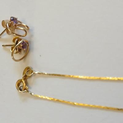 14 Kt marked bracelet with Amythyst 14 KT marked earrings