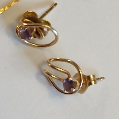 14 Kt marked bracelet with Amythyst 14 KT marked earrings