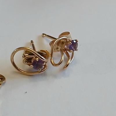 14 Kt marked bracelet with Amythyst 14 KT marked earrings