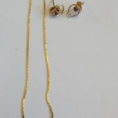 14 Kt marked bracelet with Amythyst 14 KT marked earrings