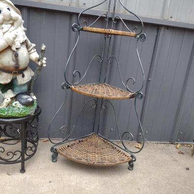 FOLDING CORNER WICKER STAND AND 1 OF THE 7 DWARFS? ON A METAL PLANT STAND