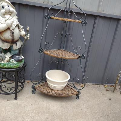 FOLDING CORNER WICKER STAND AND 1 OF THE 7 DWARFS? ON A METAL PLANT STAND