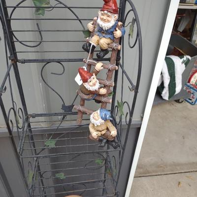 FOLDING NARROW METAL SHELF, GNOMES CLIMBING A LADDER, FLOWER POTS AND GARDEN TOOLS