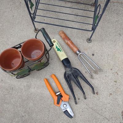 FOLDING NARROW METAL SHELF, GNOMES CLIMBING A LADDER, FLOWER POTS AND GARDEN TOOLS