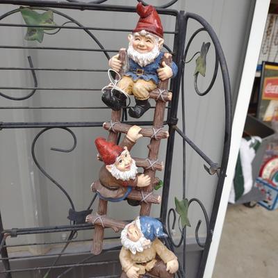 FOLDING NARROW METAL SHELF, GNOMES CLIMBING A LADDER, FLOWER POTS AND GARDEN TOOLS