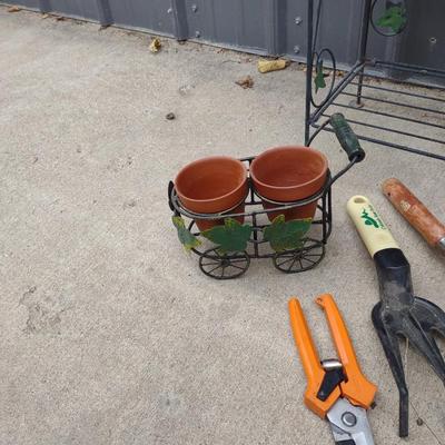 FOLDING NARROW METAL SHELF, GNOMES CLIMBING A LADDER, FLOWER POTS AND GARDEN TOOLS