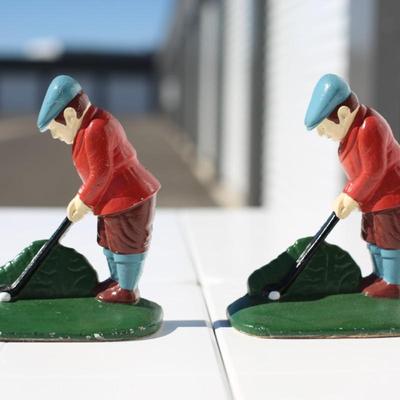 Sale Photo Thumbnail #34: 2 Cast iron bookends of man swing golf club
