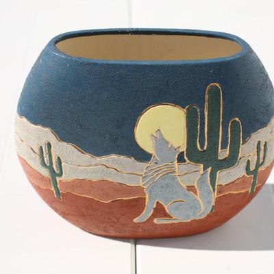 Sale Photo Thumbnail #56: South western style pottery vase featuring a howling coyote