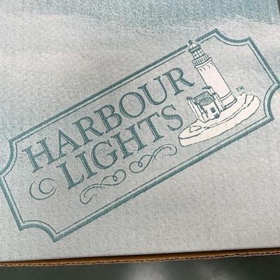 Sale Photo Thumbnail #127: Harbour Light Cana Island Lighthouse and Box.  #119   This lighthouse was introduced in January 1992 and retired in September 1995.  It includes the Certificate of Authenticity
Approximately  6.5" Tall
