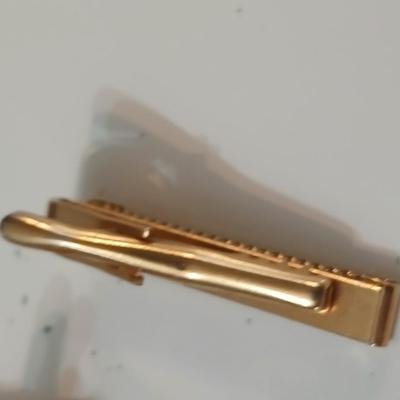 Men's tie clips and cuff links
