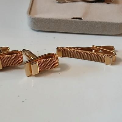 Men's tie clips and cuff links