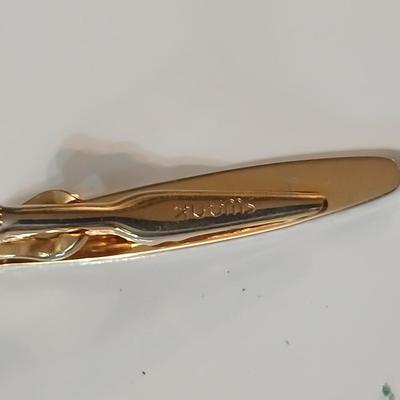 Men's tie clips and cuff links