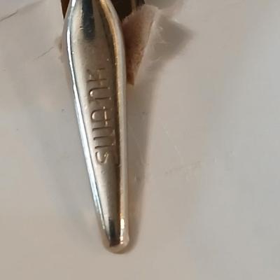Men's tie clips and cuff links