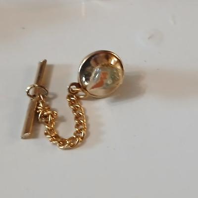 Men's tie clips and cuff links