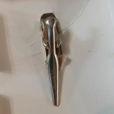 Men's tie clips and cuff links
