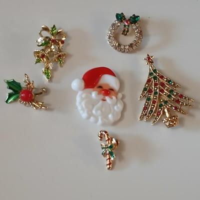 Vintage Christmas pins - Bells, tree, Santa, candy cane, holly, and a wreath